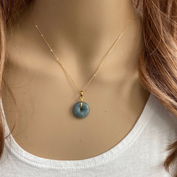 Description: 14k Solid Gold Small Round Donut Jade Pendant Necklace Item No.: Pw1.74 Metal Type: 14k Solid Gold Metal Color: Yellow Gold. Stones: Jade Measurement: 16"-18" Adjustable Length Chain. Pendant With Bale: 22 Mm X 16 Mm Pendant Weight: 2.95 - 3.15 Grams (Vary From Pieces) Chain: 1.74 Grams Pendant With Chain: 4.69 - 5.48 Grams (Vary From Pieces) Brand New With Box Jade Donut Pendant, Donut Pendant Necklace, Donut Stone Necklace, Jade Donut Necklace, Yellow Gold Necklace With Round Stone For Gift, Donut Jewelry, Donut Necklace, Jade Necklace Pendant, Shine Jewelry