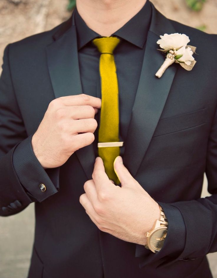 Gold tie all black suit Black And Yellow Groom Suit, Black And Gold Wedding Tuxedo Groom Attire, Black Suit With Gold Tie Groomsmen, Black Suit Mustard Tie, Black Suit With Gold Tie, Black And Gold Suit Men Prom, Black Suit Yellow Tie, Black Suit Gold Tie, Black And Gold Suit Men