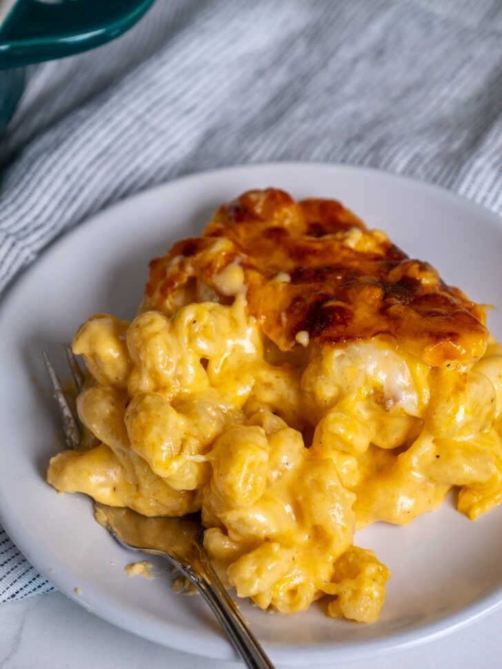 a white plate topped with macaroni and cheese