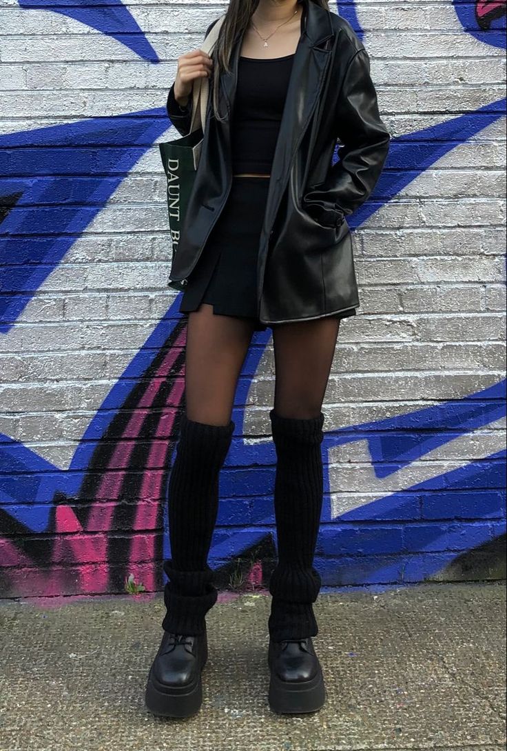 leather jacketmini skirtleg warmersplatform boots Mini Skirt Platform Boots Outfit, Black Skirt And Leg Warmers, Fits With Boots Aesthetic, Black Skirt And Jacket Outfit, Platform Boots Leg Warmers, Leg Warmers Boots Outfit, Mini Leather Jacket Outfit, Mini Skirt Big Jacket Outfit, Dr Martens Dressed Up