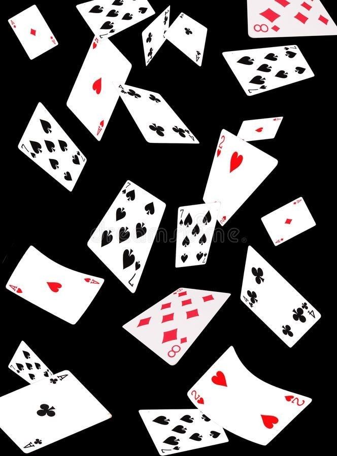 playing cards falling down in the air on black background stock photo - image 459784