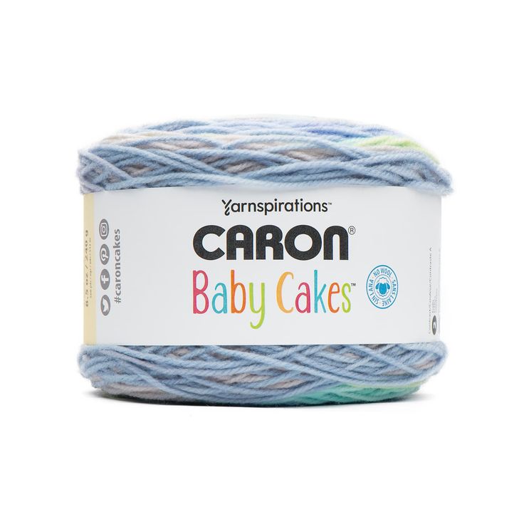 yarn ball in blue and white with the words carbon baby cakes on it's side