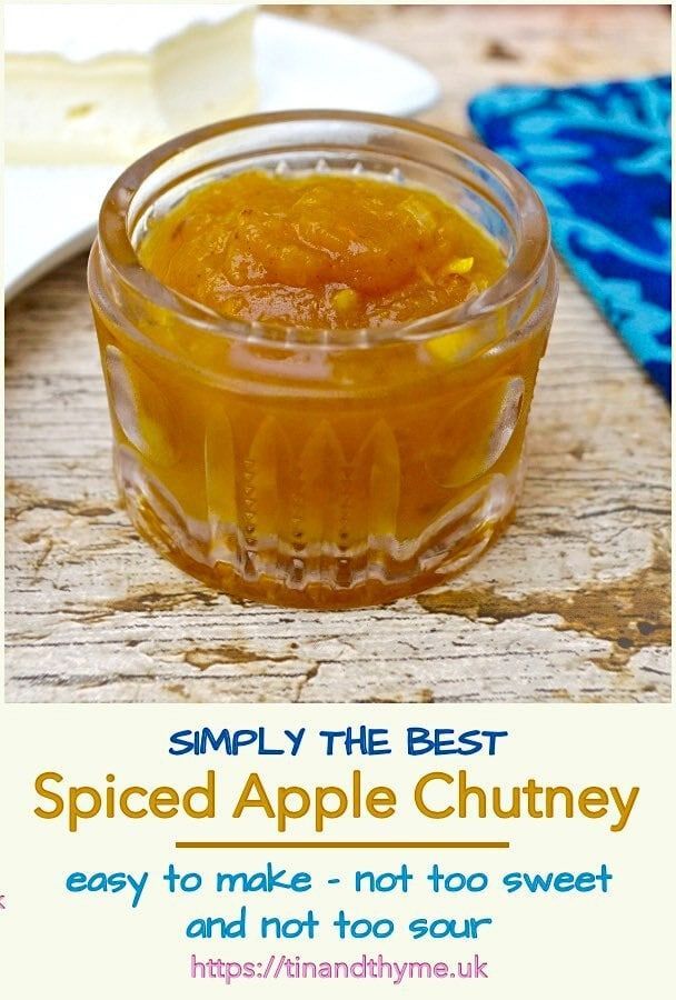 an apple chutney in a glass jar with the words simply the best spiced apple chutney easy to make - not too sweet and hot so sour