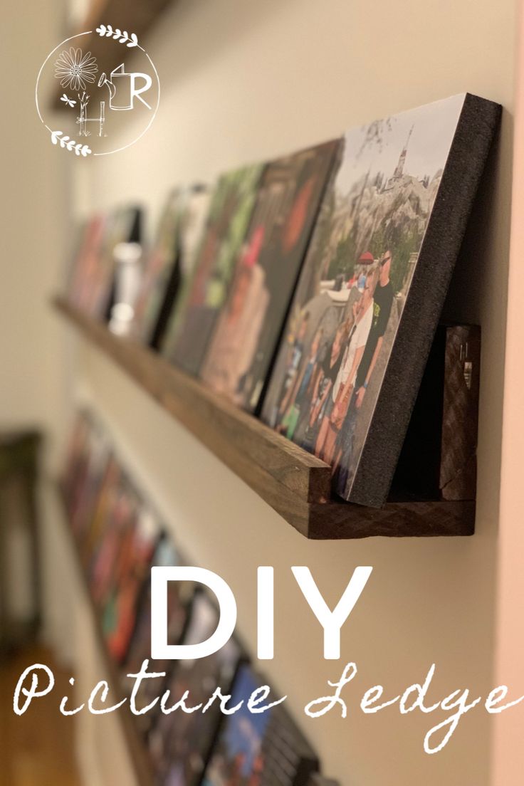 some pictures are hanging on the wall and there is text that says diy picture ledges