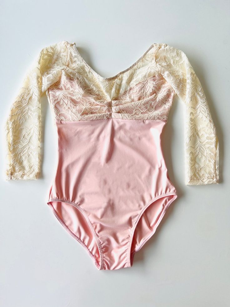 Lace Sleeve Leotard Ballet Pink  THE COLLECTIVE DANCEWEAR Lace Sleeve Leotard - Ballet Pink#mLeotardTHE COLLECTIVE DANCEWEAR Sewing Leotards, Leo Fashion, Childrens Leotards, Ballet Attire, Ballet Outfits, Leotard Outfit, Ballet Leotards For Girls, Leotard Ballet, Ballet Accessories