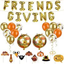 a bunch of balloons that say friends giving