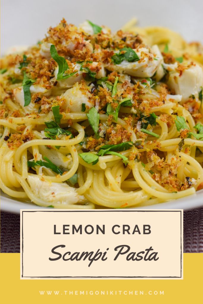 lemon crab scampi pasta on a white plate with text overlay that reads lemon crab scampi pasta