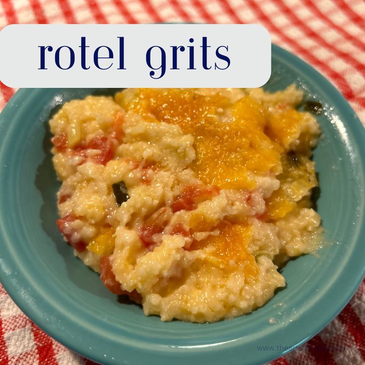 a blue plate topped with food on top of a red and white checkered table cloth