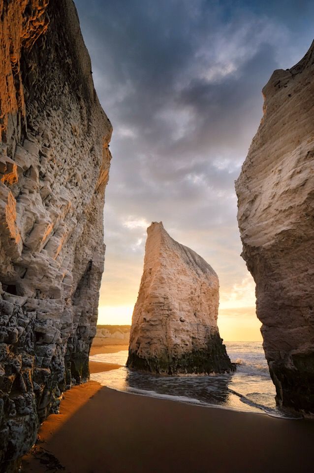 two large rocks sticking out of the water