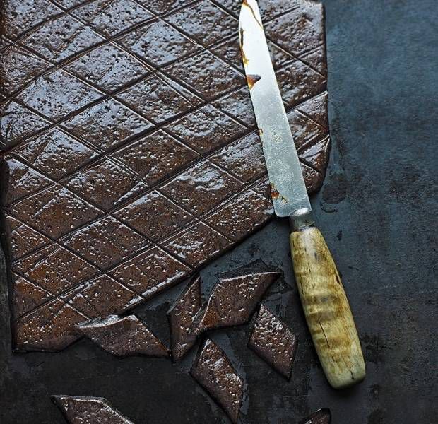 a knife is laying on top of some brownies