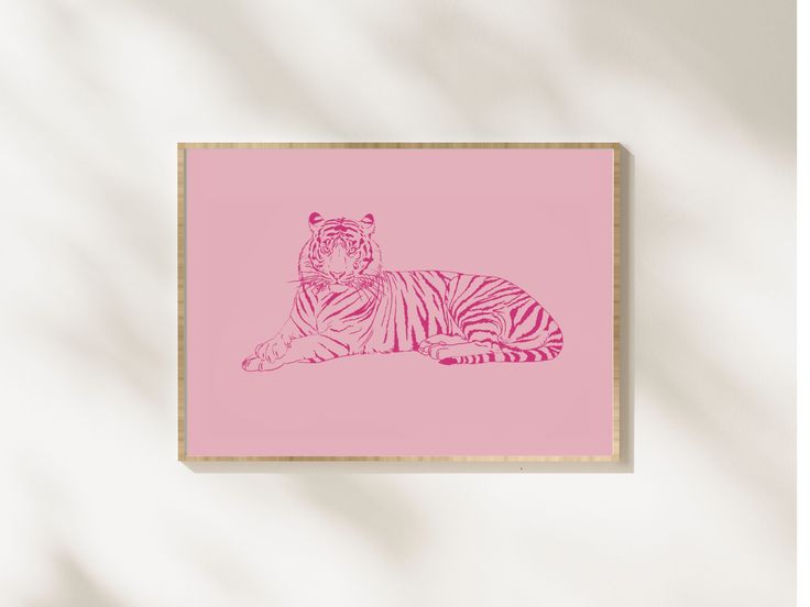 a pink and white drawing of a tiger laying on the ground in front of a wall