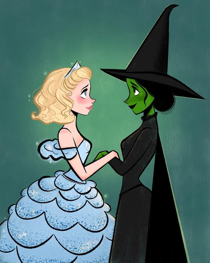 an image of a woman in a witch costume talking to a man wearing a black hat