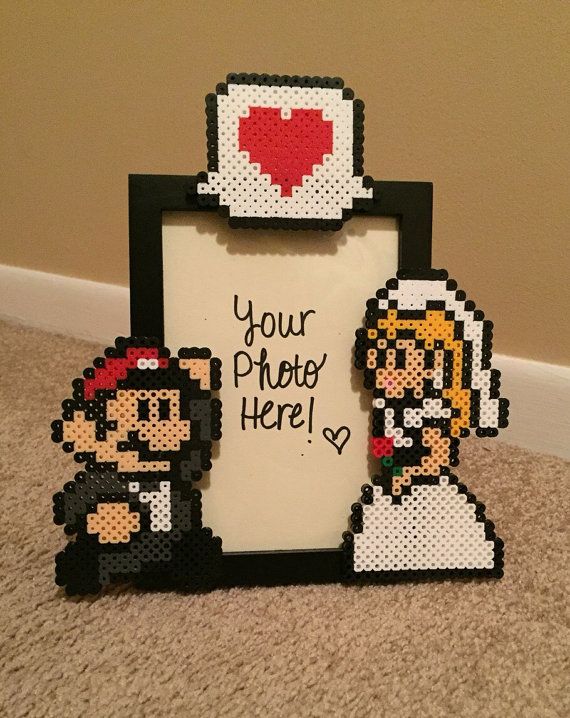 a pixelated photo frame with an image of mario and luigi