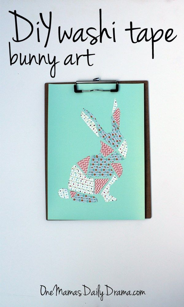 a clipboard with a drawing of a rabbit on it