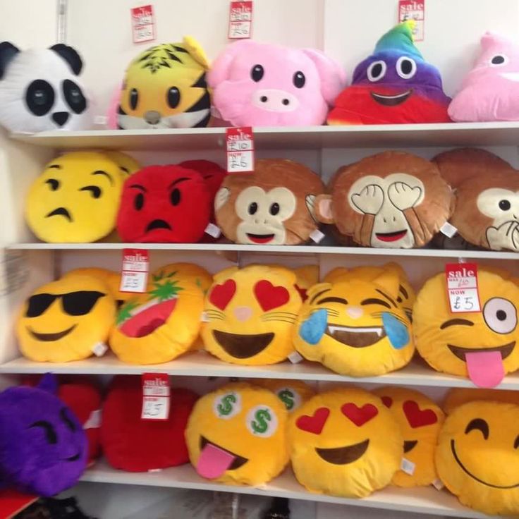 the shelves are filled with many different types of emotictive stuffed animals and plush toys