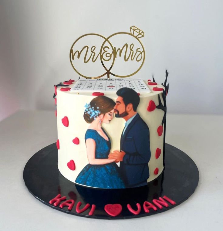 a wedding cake with an image of a couple on it