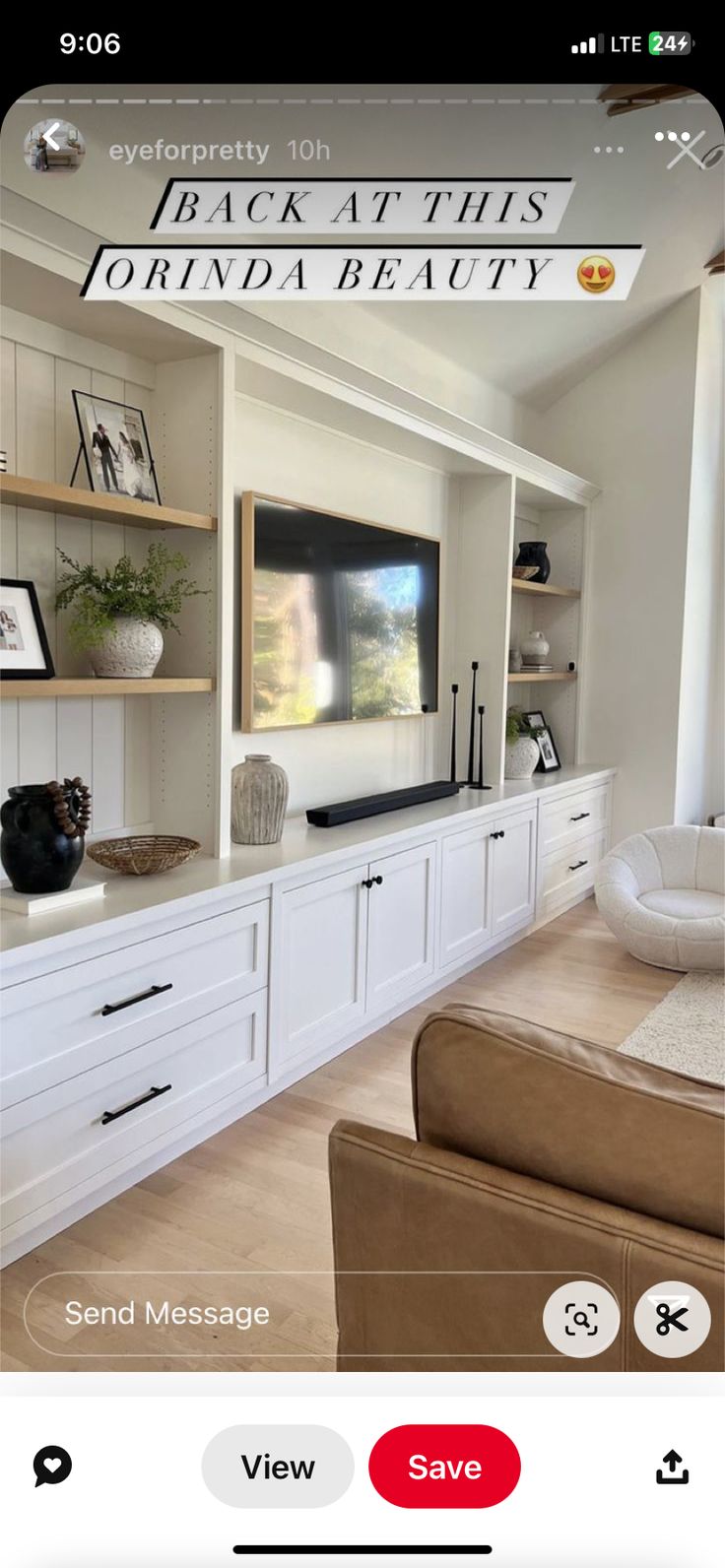 a living room filled with furniture and a flat screen tv on top of a wall