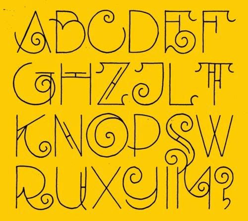 an old fashioned font that has been drawn in the style of doodles on yellow paper