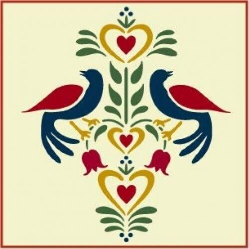 two birds sitting on top of each other in front of a heart and flower design