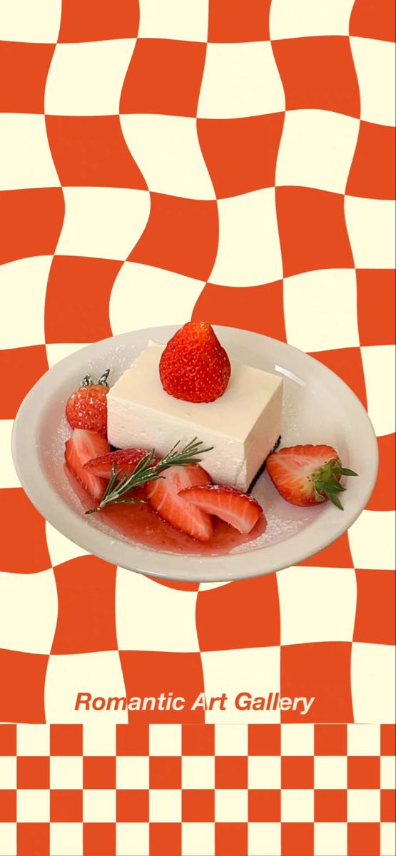 a piece of cake with strawberries on top is sitting on a checkered plate