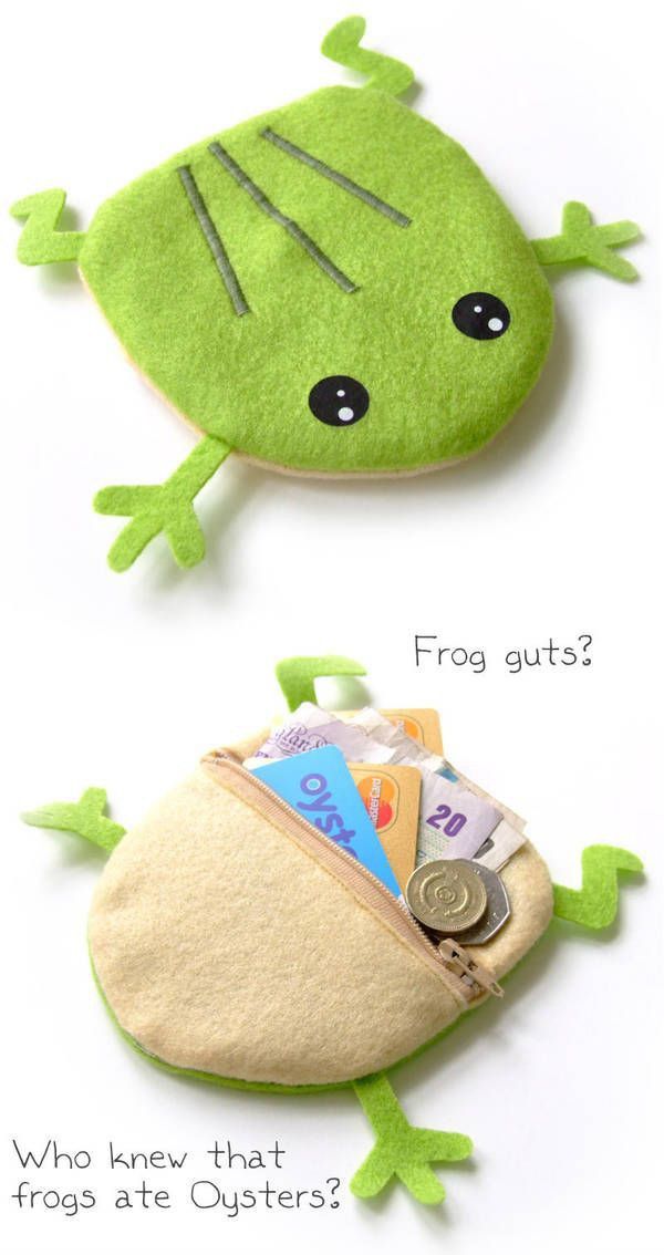 a frog purse with money in it's pouch and the words frog guts?