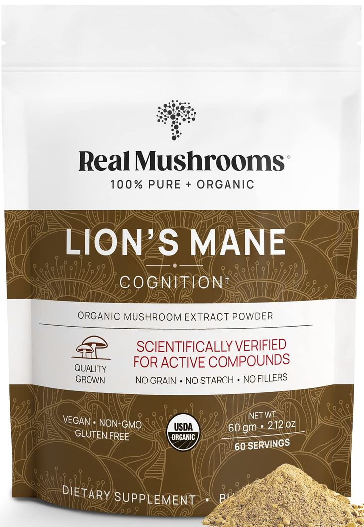 a bag of lion's mane powder next to a pile of ground cinnamons