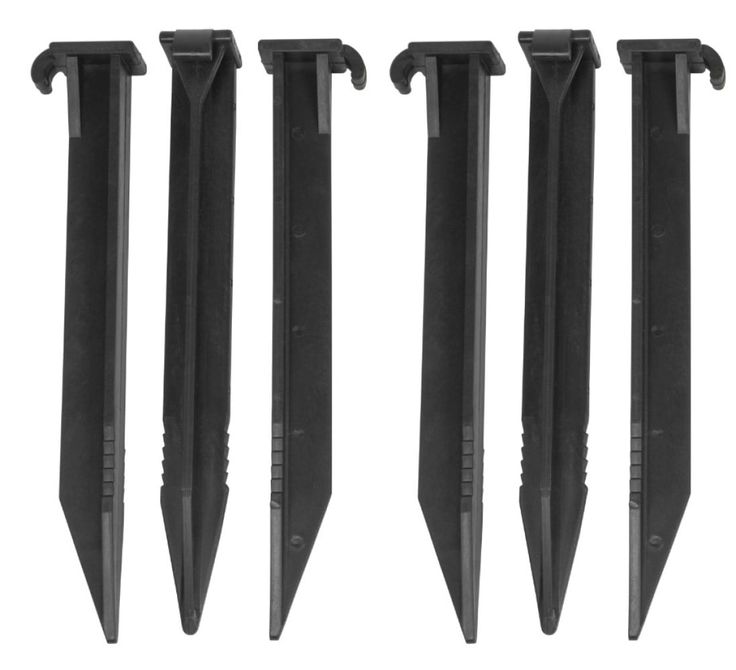 four knives are lined up next to each other