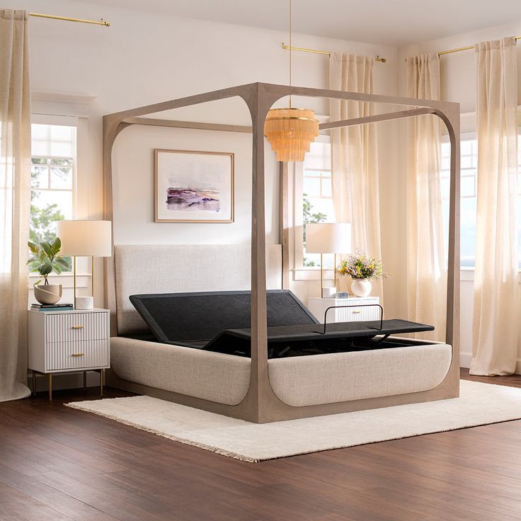 a bedroom with a bed, nightstands and windows