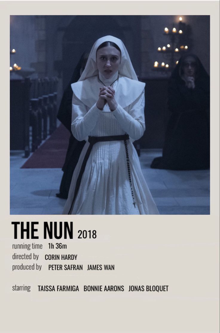 the nun movie poster with woman in white dress