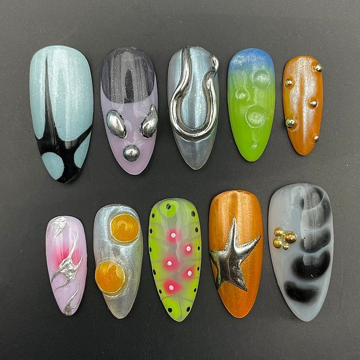 Unleash your inner style maven with our Gothic-inspired, freestyle hand-painted press-on nails. Featuring colorful fall motifs on almond-shaped acrylics, these long nails are perfect for any custom party look. Reusable and easy to apply, they bring Y2K vibes with the convenience of glue-on application. 🌸Thank you for supporting my small business.🌸 You can reuse all the nails you purchased from us multiple times, if you handle them with care 📦𝐖𝐡𝐚𝐭 𝐜𝐨𝐦𝐞𝐬 𝐰𝐢𝐭𝐡 𝐲𝐨𝐮𝐫 𝐩𝐫𝐞𝐬𝐬 𝐨 Avant Garde Nails Art, Cute But Simple Nails, Nails Y2k Short, Funky Acrylic Nails, Cute Nails Y2k, Junk Nail Designs, Kitsch Nails, Sequin Nails, Chunky Nails