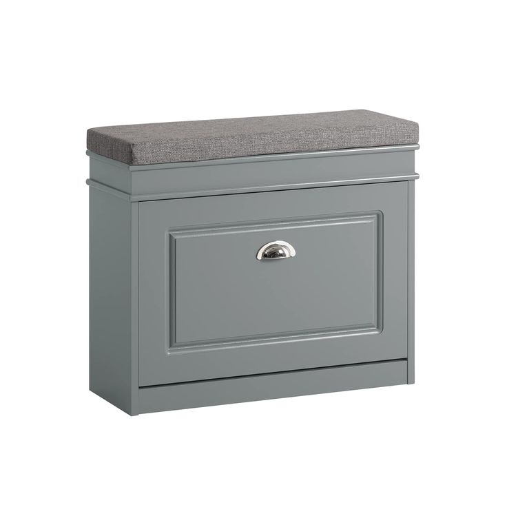 a grey storage box with a gray cushion on the top and two drawers below it