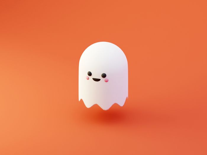 a small white ghost on an orange background