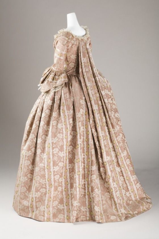 Rococo Fashion from 18th century ball gown dress Robe a la Francaise circa from 1760-1780. Sack Back Closed Robe #Historical #Costume made from silk with plain weave flower floral pattern, fabric gather as flounce decorated with woven braid trim and tulle lace on the matching stomacher bodice, sleeve and also on the skirt and the petticoat. #Vintage #Rococo #Fashion 18th Century Ball Gown, 1760s Fashion, 18th Century Dresses, 18th Century Gown, 1700 Fashion, 18th Century Dress, Rococo Fashion, 18th Century Costume, 18th Century Clothing