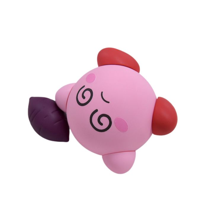 a pink and purple toy with horns on it's head, sitting in the air