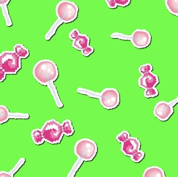 pink lollipops are scattered on a green background in this seamless pattern