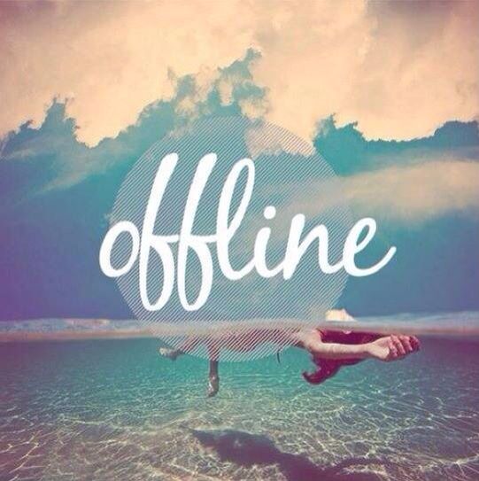 an image of someone floating in the ocean on their surfboard with the words offline above them