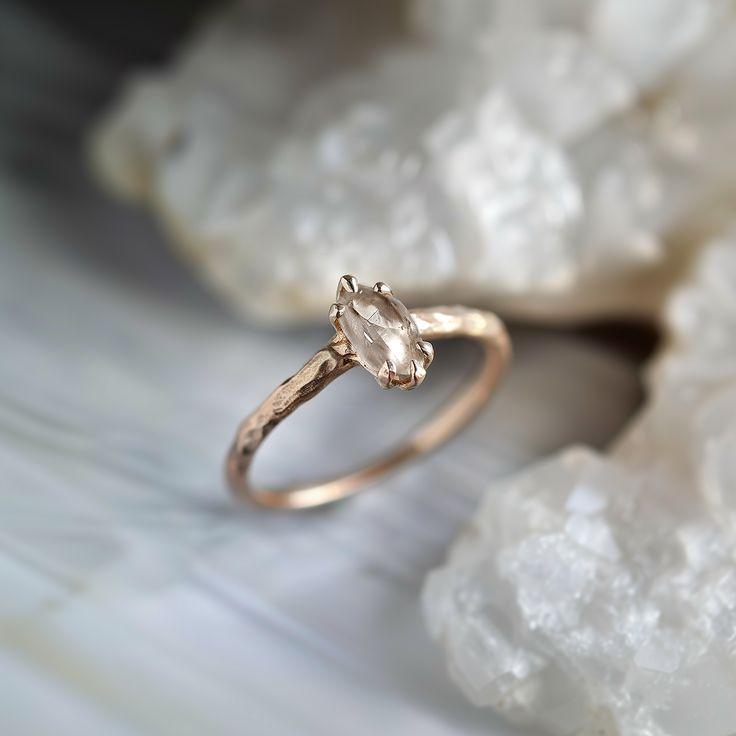 a close up of a ring on some rocks