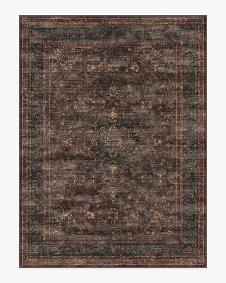 an area rug with brown and black colors