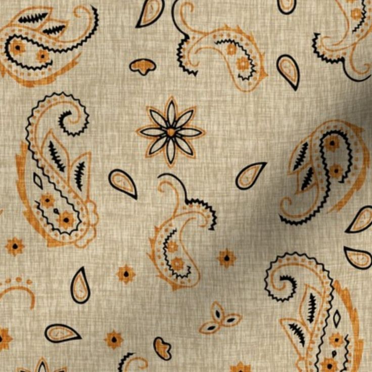 an orange and black paisley print fabric