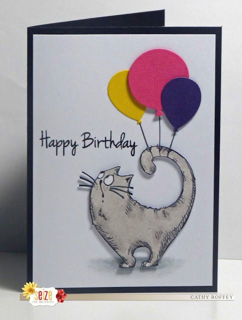 a birthday card with a cat holding balloons