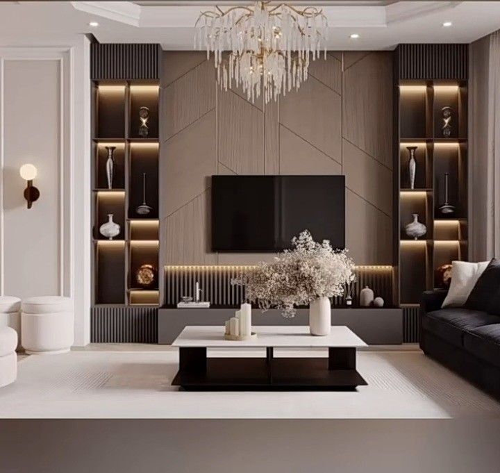 modern living room with black and white furniture, chandelier and large mirror on the wall