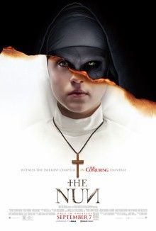 the nun movie poster with an evil nun