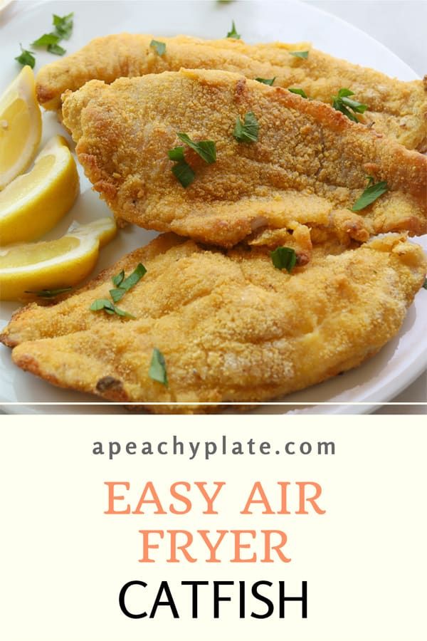 easy air fryer fried fish recipe with lemons and parsley on the side