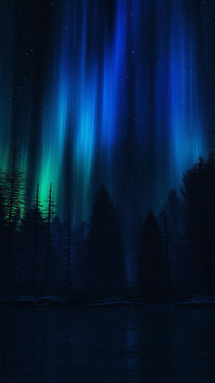 the sky is filled with green and blue aurora bores in the night, as well as