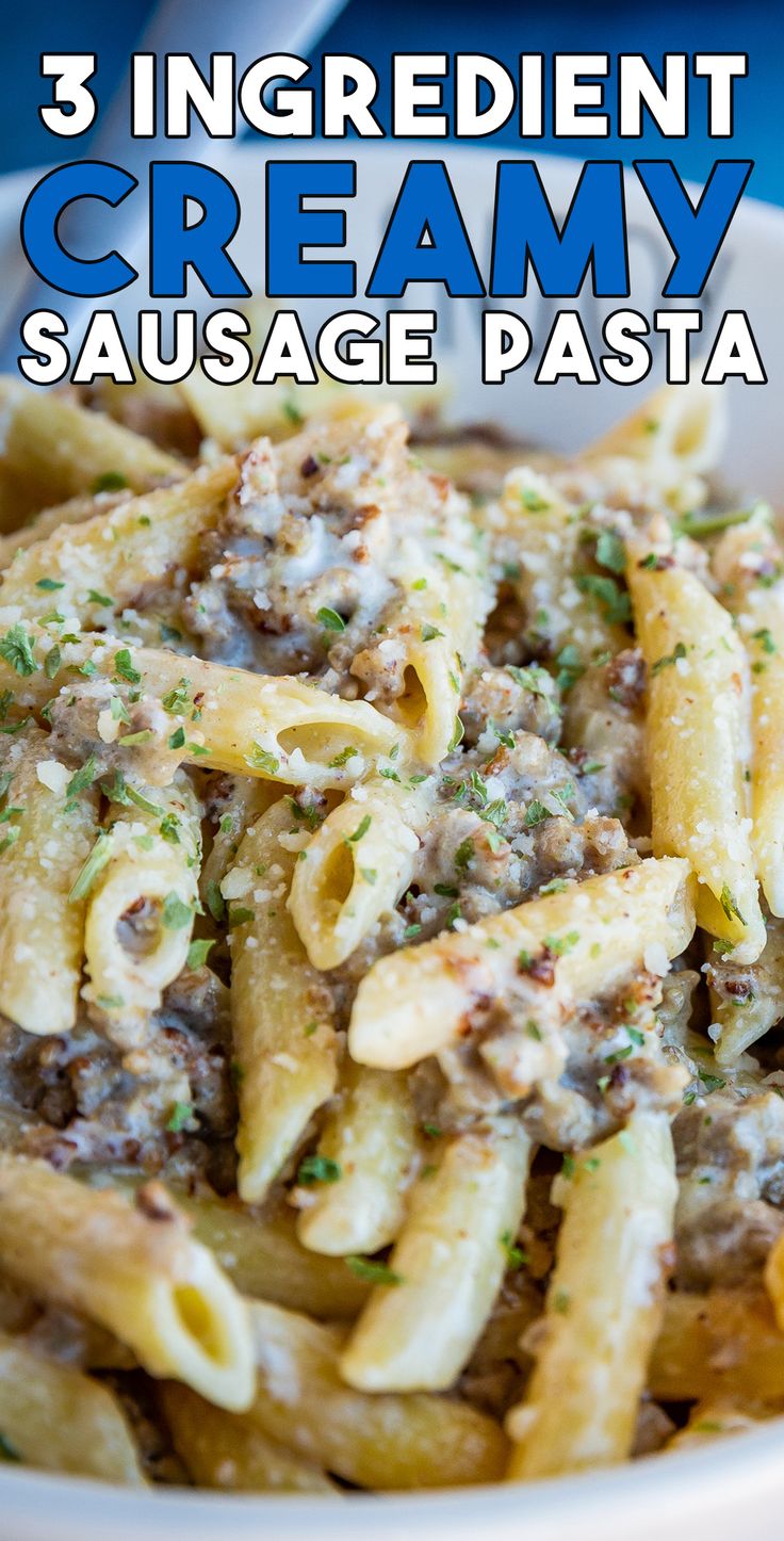 a white bowl filled with pasta covered in sauce