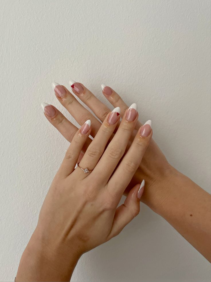 White French Red Heart Nails, White French Tip With Red Heart Nails, White French Heart Nails, French Tip Nails With Small Heart, White French Nails With Red Heart, White French Tip With Heart Nails, White French With Hearts Nails, French Tip With Red Design, White French With Red Heart