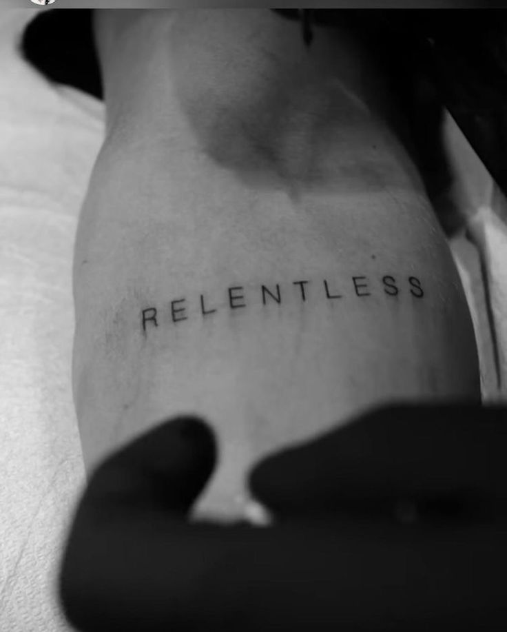 a person with a tattoo on their arm that says,'relienties '