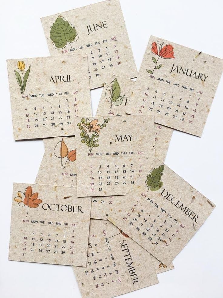 several calendars with flowers and leaves on them