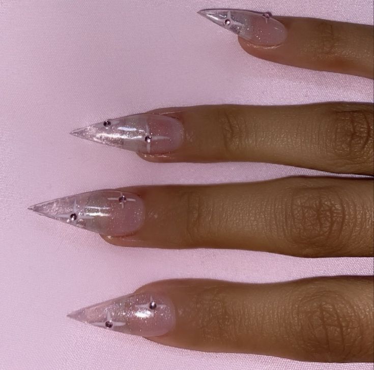 Pink Vampire Nails, Gothic Pink Nails, Clear Nails Glitter, Pink Gothic Nails, Icy Blue Nails Acrylic, Sharp Nails Design, Clear Stiletto Nails, Kitty Claws Nails, Jelly Acrylic Nails