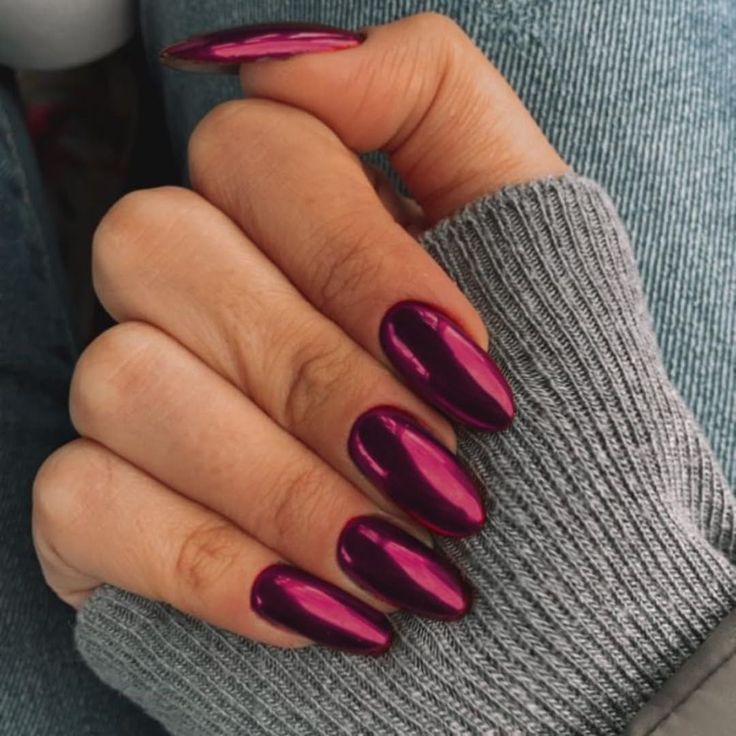 If you want to mix things up, why not try burgundy chrome nails with a matte finish? The combination of a chrome base and a matte top coat creates an interesting contrast between shine and texture. Matte nails have been a popular trend in recent years, offering a more subtle and sophisticated alternative to the typical glossy finish.  To achieve this look, apply a matte top coat over your burgundy chrome nails. This not only reduces the shine but also gives the nails a soft, velvety appearance. Nail Art Designs For Dark Hands, Fuscia Nails Chrome, Fuchsia Chrome Nails, Purplish Pink Nails, Deep Purple Chrome Nails, Chrome Nail Inspiration, Dark Pink Gel Nails, Nails Chrome Purple, Chrome Nails Designs Pink